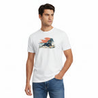 Man wearing a white t-shirt with a graphic design of a labrador on a surf on a white background