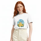 Woman wearing a white t-shirt with a graphic design on a white background